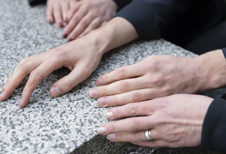 mourning-family-together-cemetery